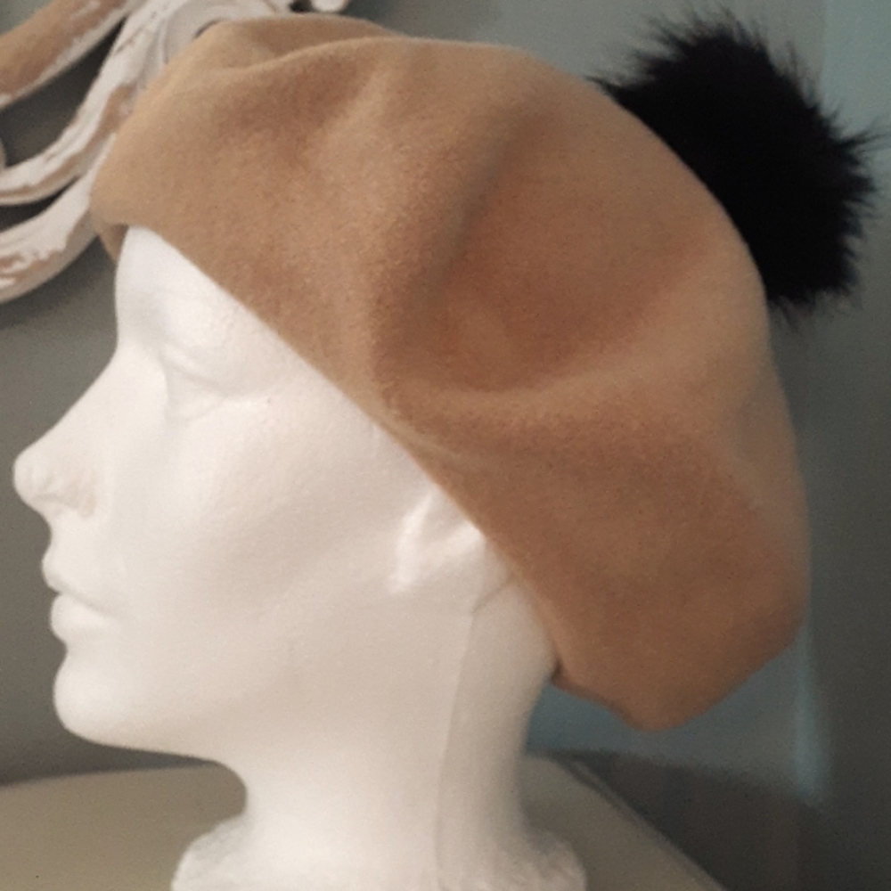 % Parkhurst tan wool beret with black faux fur pom pom